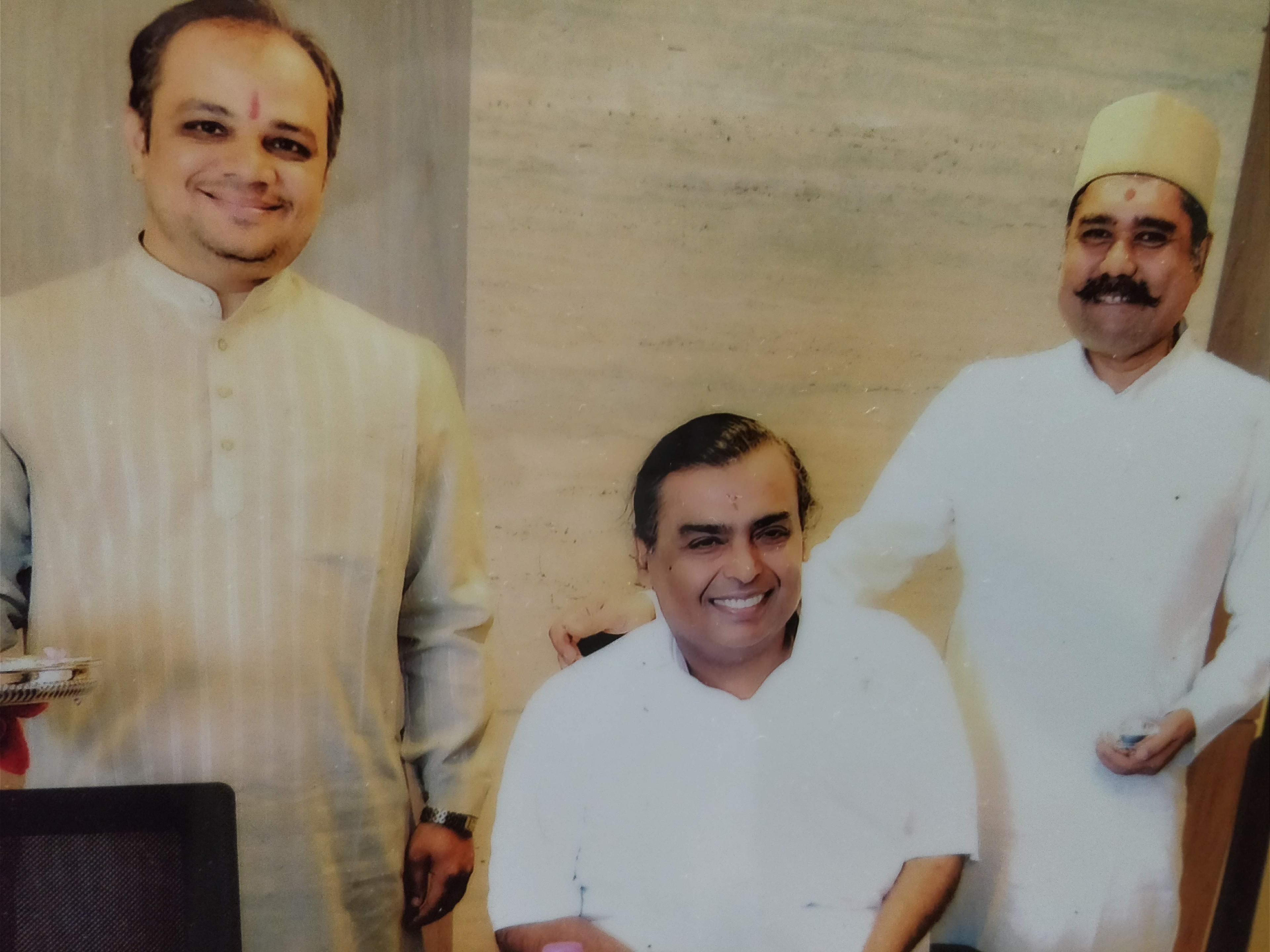 Pandit Chandrashekhar Sharma with the Ambani Family